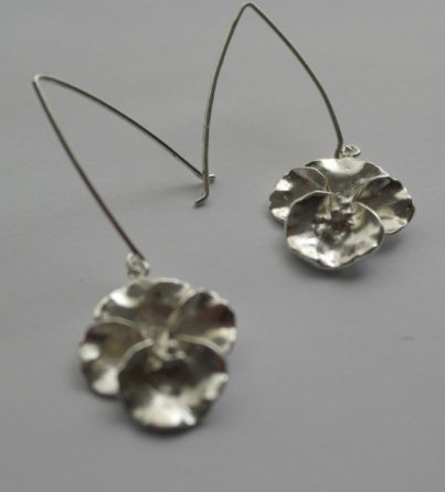 andrea-cardona-aretes-en-plata-orquidea-en-plata