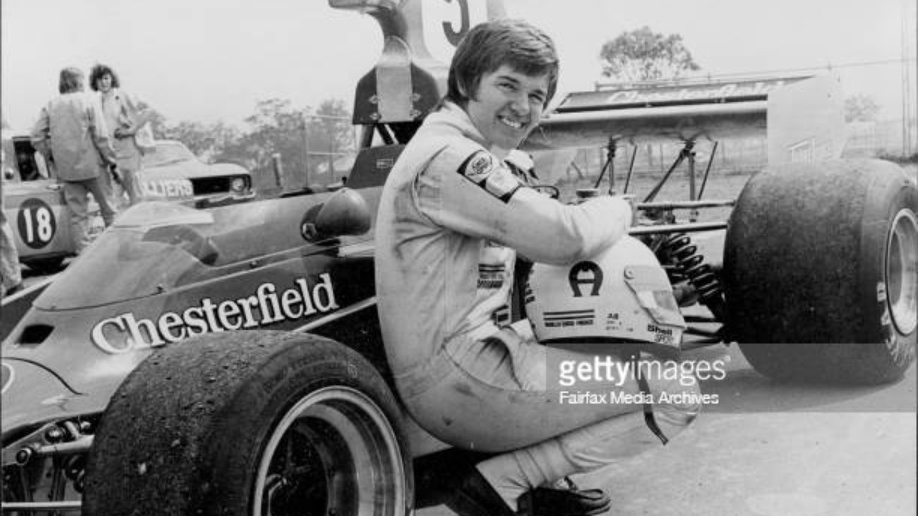 Miss Lella Lombardi, Italian female racing car driver trying out the size of Kevin Bartlett's Lola F5000 at Oran Park today. November 13, 1974. (Photo by Wayne Russell Black/Fairfax Media via Getty Images).